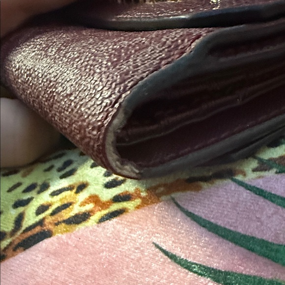 Michael Kors Plum Textured Wallet - Picture 7 of 11